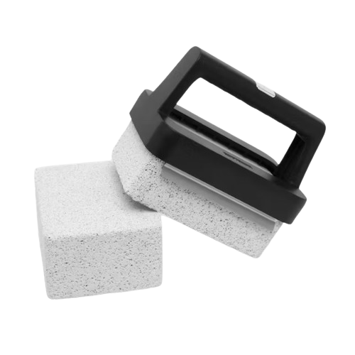 White pumice stone scrubber with black handle for grill and outdoor cleaning tools and sponges collection