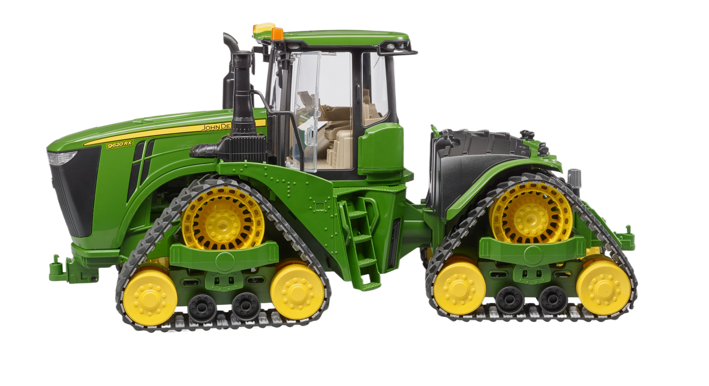 Green Bruder toy model of John Deere 9620RX crawler tractor with detailed yellow track belts from Vehicles & Remote Controlled Toys collection