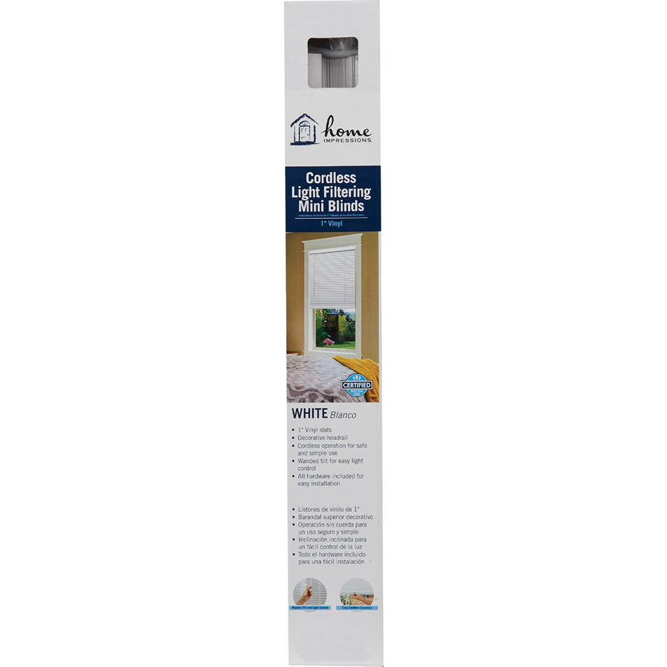 White cordless vinyl mini blind with light filtering slats for window privacy and home improvement use