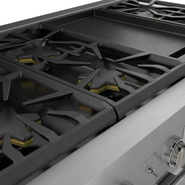 close-up of professional stainless steel gas cooktop with heavy-duty cast iron grates in kitchen appliance collection