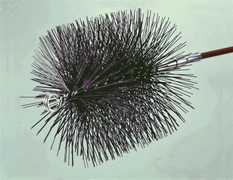 Round poly chimney brush with dense black bristles and metal handle for cleaning chimneys and home improvement tasks