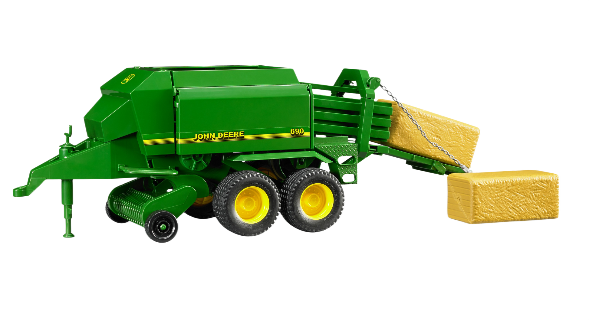 Green Bruder John Deere baler toy with yellow wheels and two detailed rectangular hay bales in Toys & Games collection