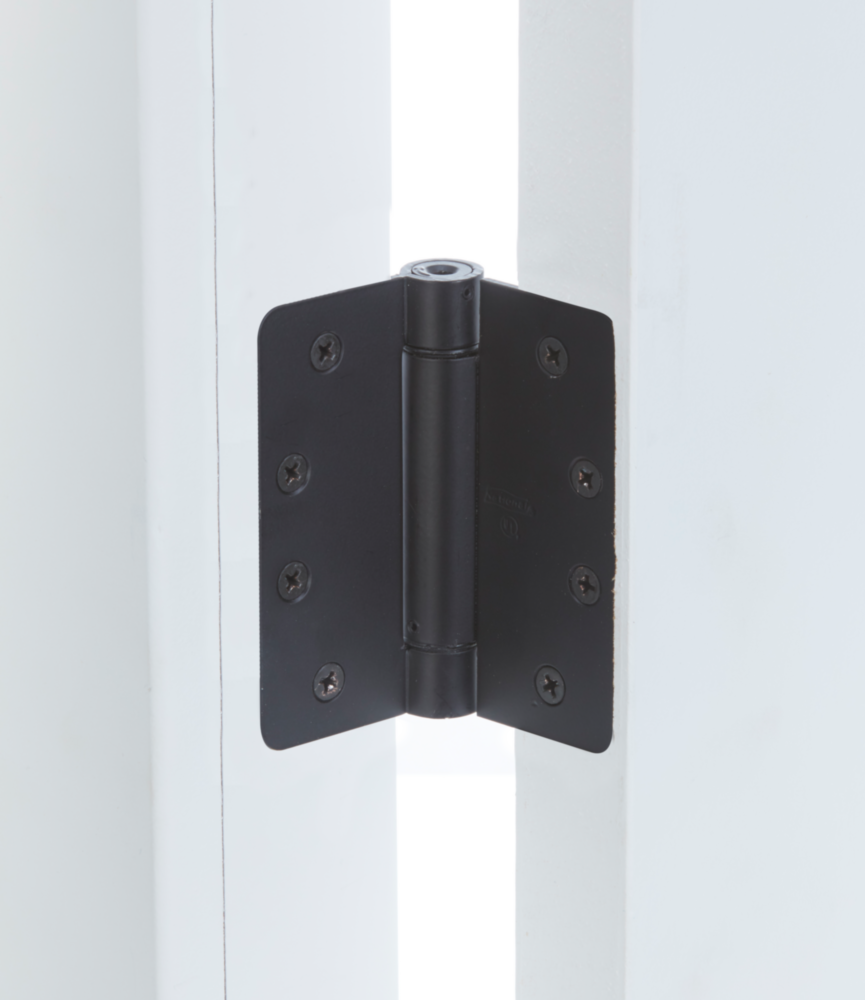 4-inch oil rubbed bronze spring door hinge with eight mounting screws for home improvement and door hardware projects