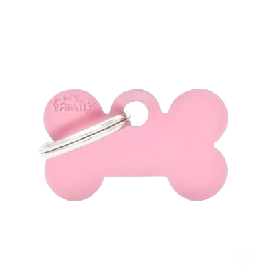 Small pink bone-shaped dog tag with metal ring for pet identification and personalization