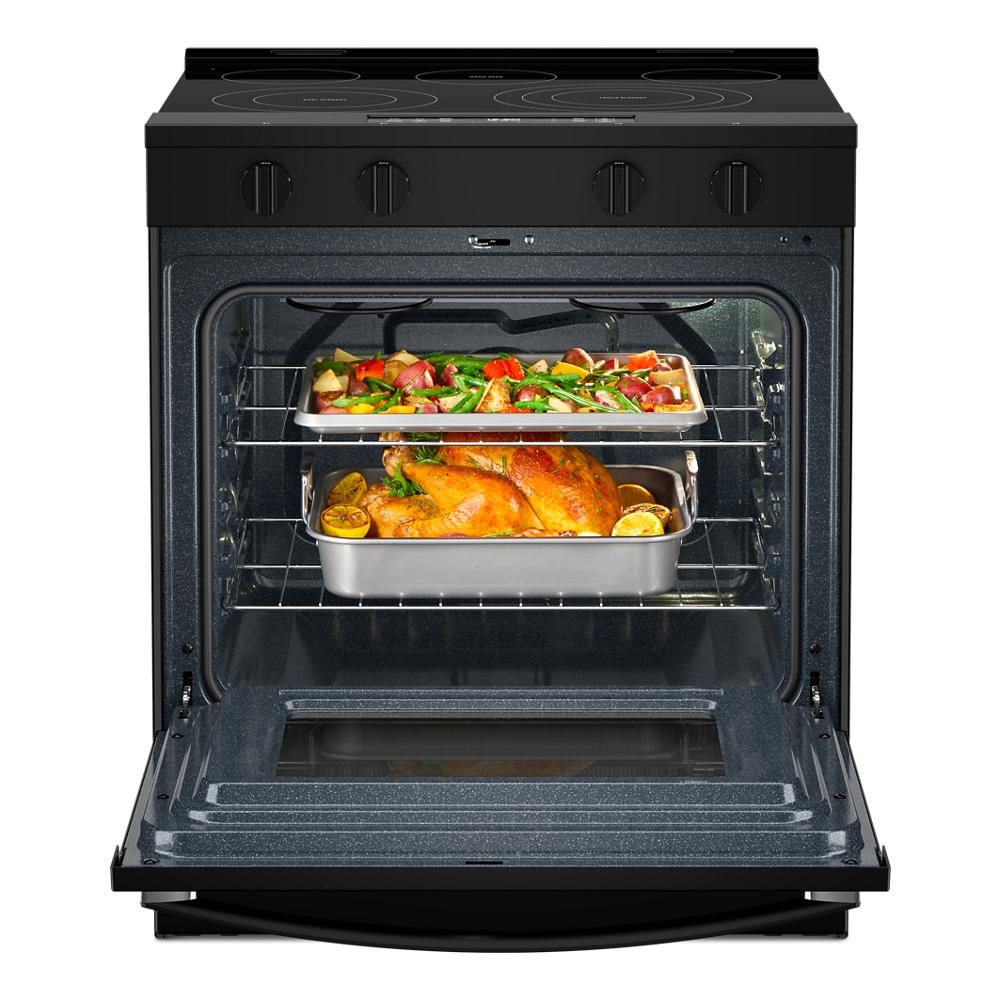 Electric smart range with Air Cooking Technology showing roasted chicken and vegetables inside oven in kitchen appliances collection