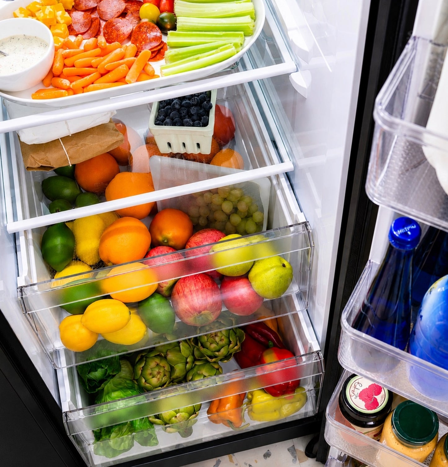 GE® ENERGY STAR® 23.6 Cu. Ft. Counter-Depth Side-By-Side Refrigerator with Extra Tall Dispenser and In-Door Icemaker