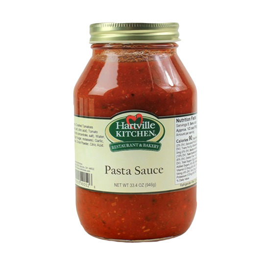 Glass jar of Hartville Kitchen pasta sauce with gold metal lid and label showing product and nutrition details