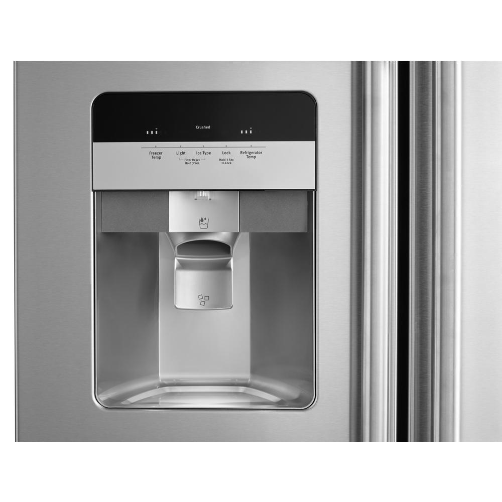 Close-up of stainless steel refrigerator water and ice dispenser control panel in kitchen appliances collection