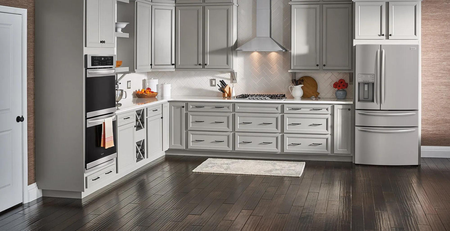 modern kitchen with stainless canopy wall-mounted hood and stainless steel appliances in kitchenware collection