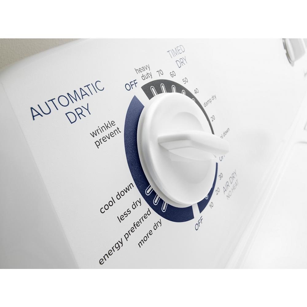 Close-up of white electric dryer control knob showing multiple drying cycle options for home improvement use