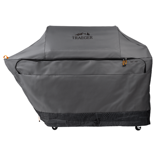 Durable gray full-length grill cover with zippered pocket, designed for Traeger Timberline XL grills in outdoor living spaces