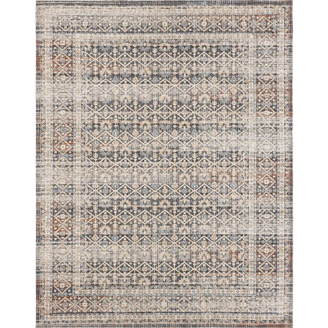 Traditional patterned rug with muted slate blue, beige, and brown tones featuring a detailed geometric design