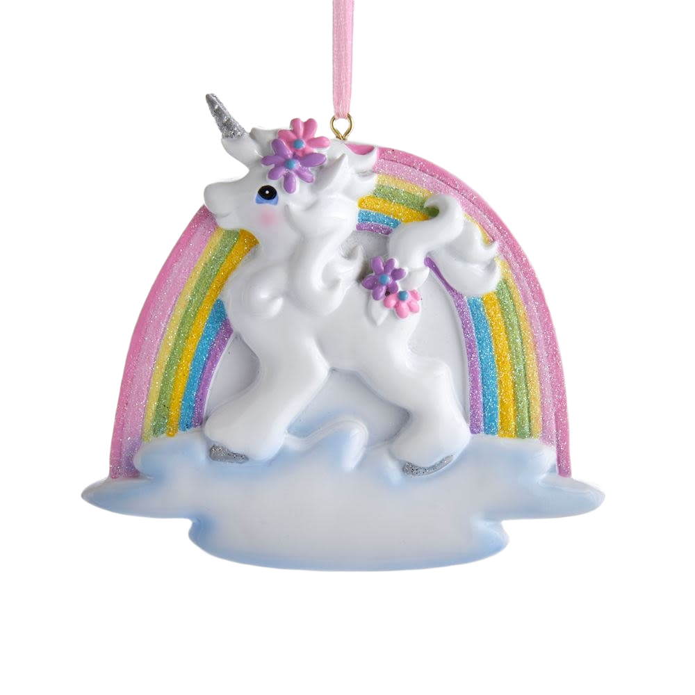 White unicorn ornament with purple flowers standing on clouds in front of a pastel rainbow with gold glitter accents