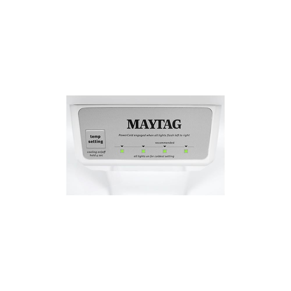Close-up of Maytag refrigerator temperature control panel with illuminated green indicator lights on white background