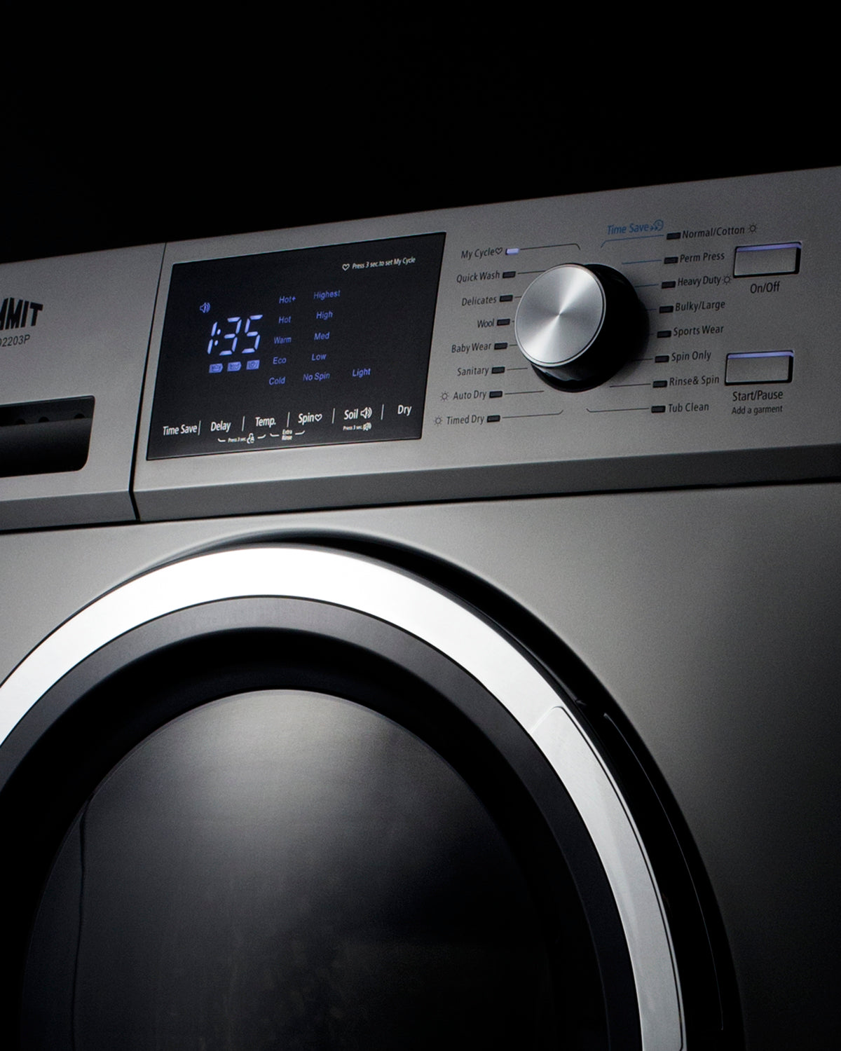 Close-up of platinum finish 24-inch washer/dryer combo control panel with digital timer and cycle selector knob