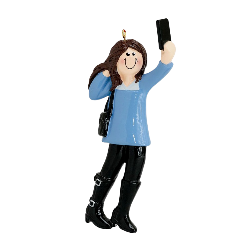Cheerful female figure ornament taking a selfie wearing blue top and black boots from Christmas Ornaments collection