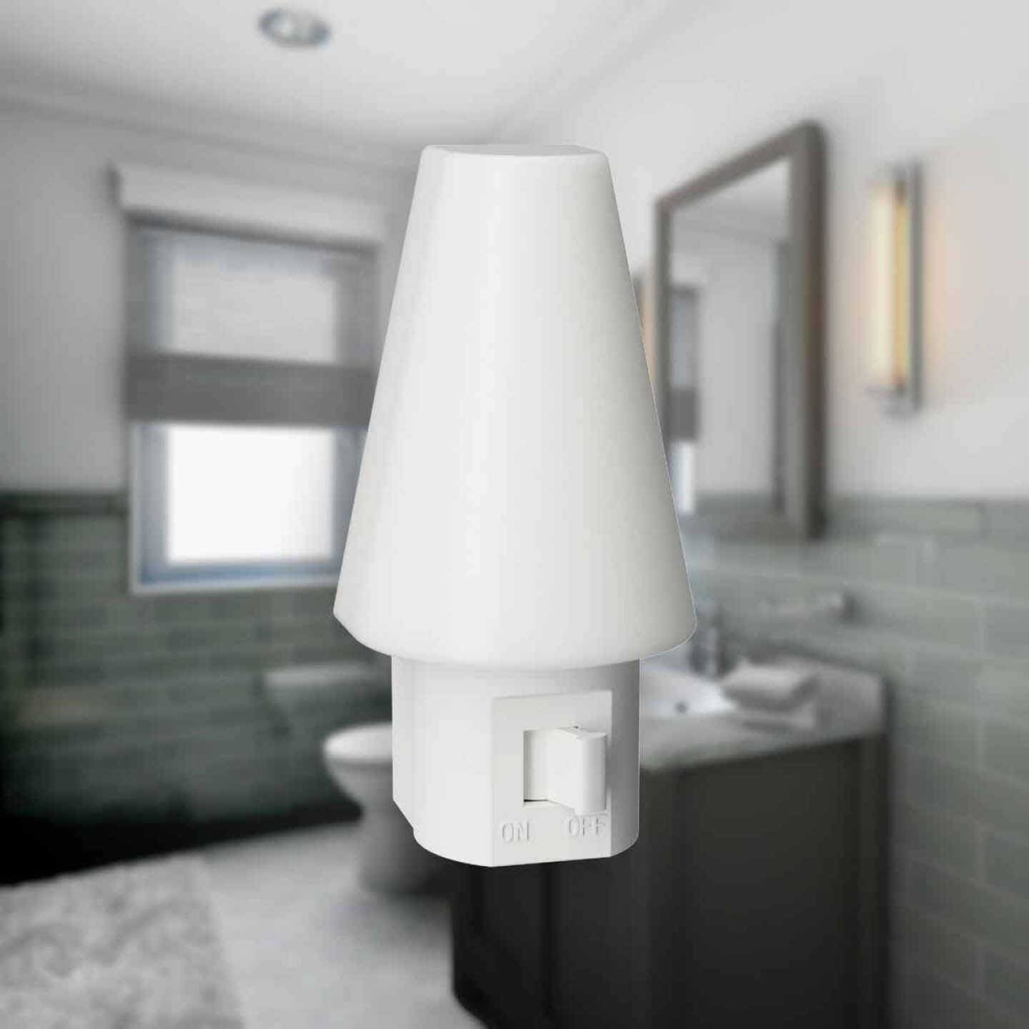 White plug-in LED night light with frosted lens and on/off switch, part of Electrical and Night Lights collections under $50