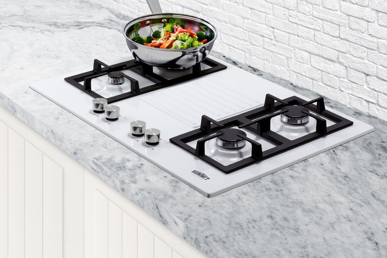 White four-burner gas cooktop with stainless steel pot and control knobs from Cooktops and Appliances collections