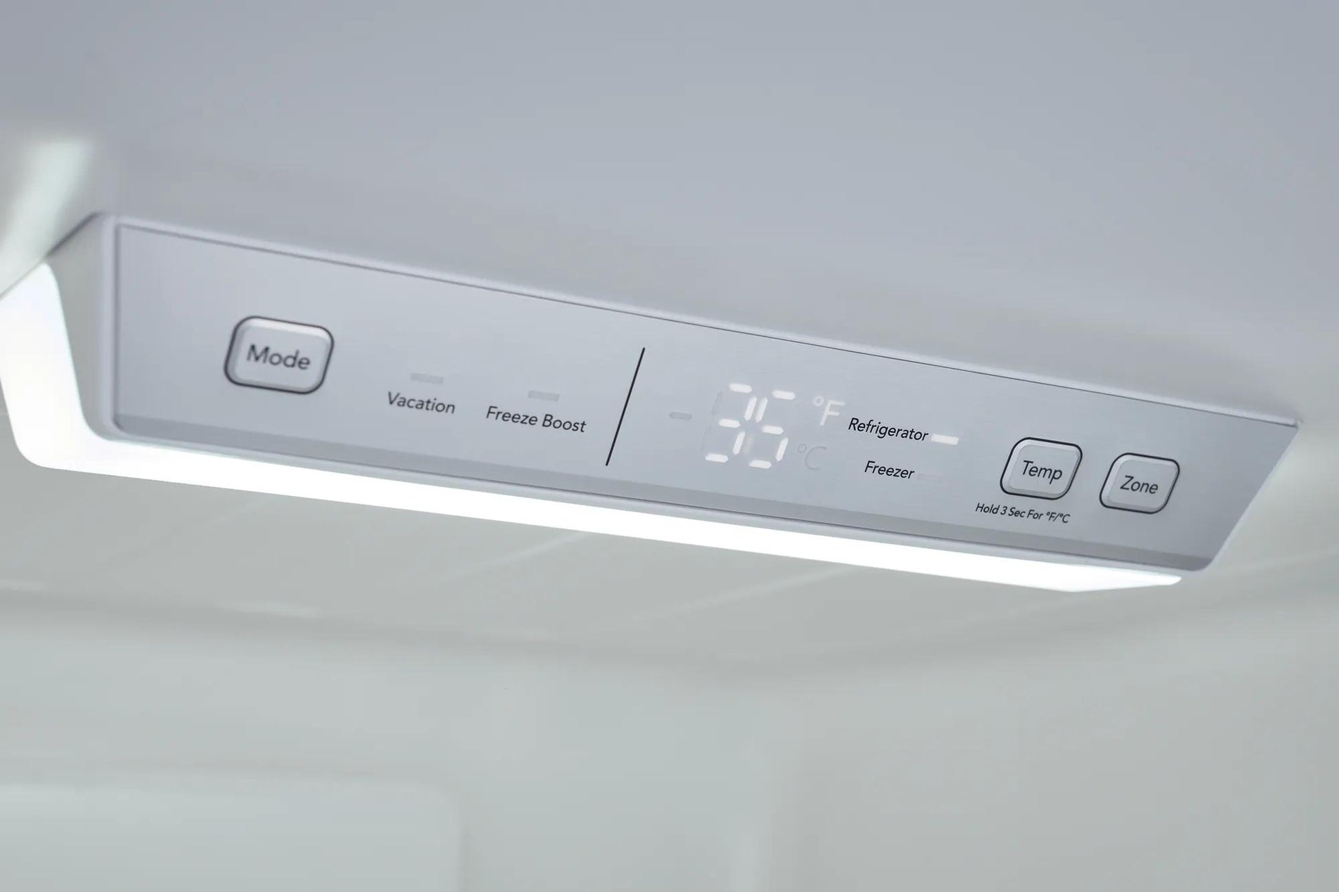 Close-up of refrigerator temperature control panel with digital display and adjustable mode, temperature, and zone settings in appliances collection