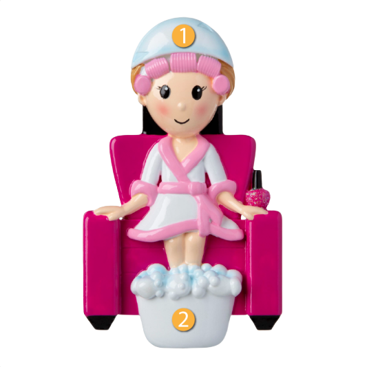 Pink-robed salon client ornament seated with hair in rollers under dryer and feet soaking in bubbly foot bath for Christmas decor