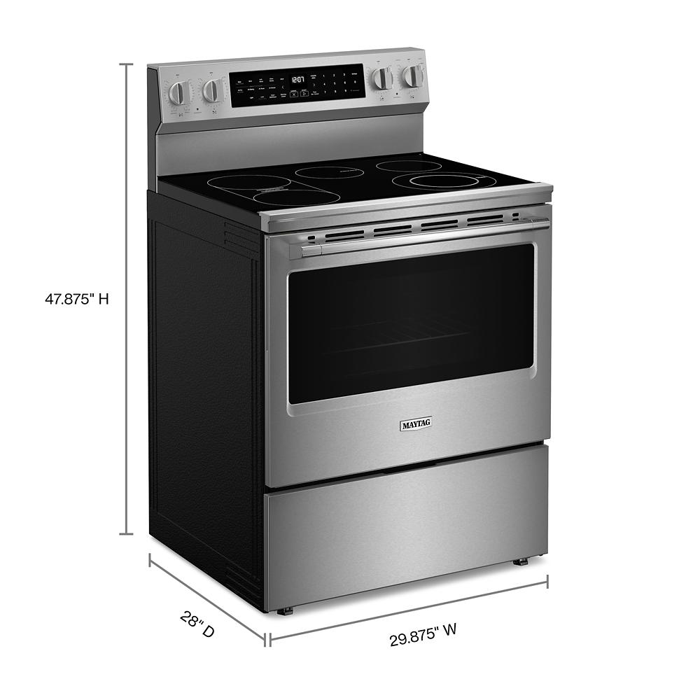 Stainless steel electric range with smooth cooktop and digital display in kitchen appliances and ranges collection