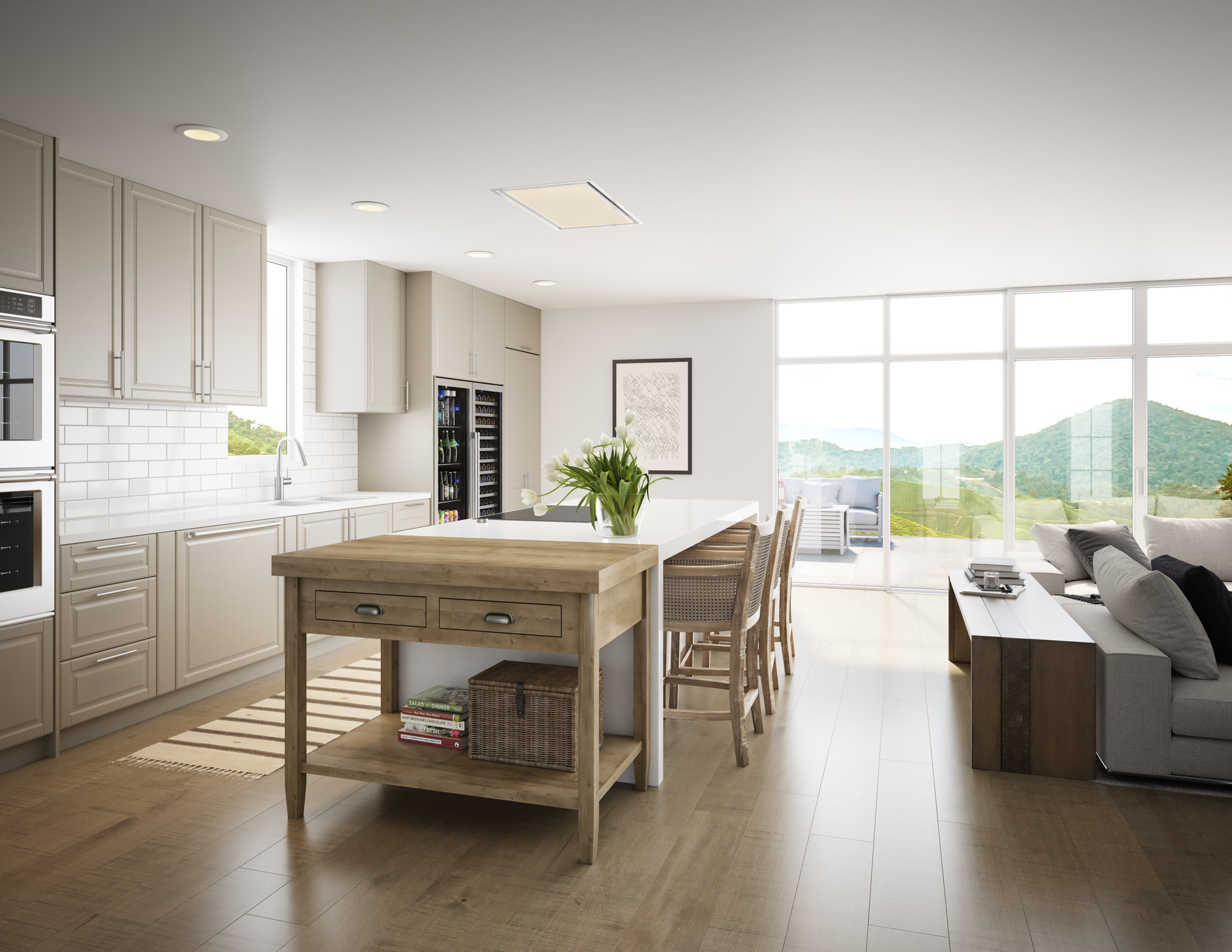 Modern kitchen scene featuring a white in-ceiling island range hood above a wooden island table, surrounded by cabinetry and natural light, part of Range Hoods, Kitchen & Kitchenware, All Products, Appliances at Hartville Hardware.