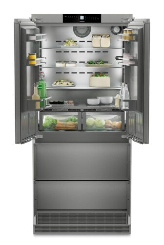 Built-in stainless steel French door refrigerator with open doors, adjustable shelves, and bottom freezer drawers in appliances collection