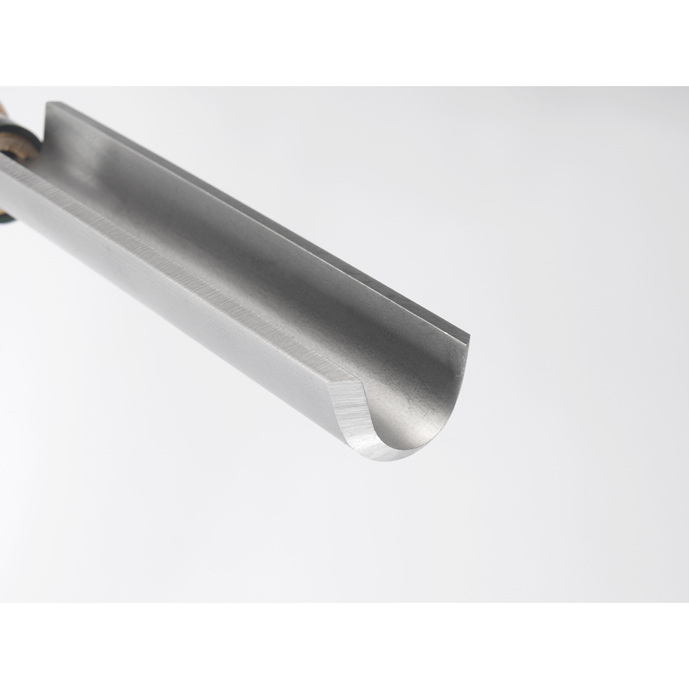 Close-up of a 1-inch high-speed steel roughing gouge with smooth polished cutting edge and wooden handle for home improvement tasks