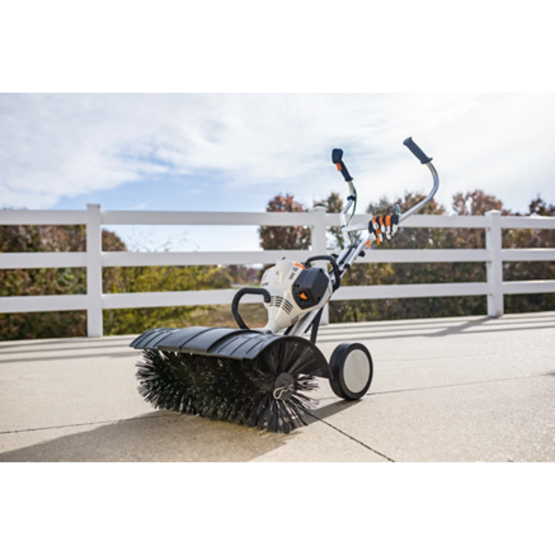 Gas-powered outdoor sweeper with rotating brush and ergonomic handles for tools and home improvement tasks