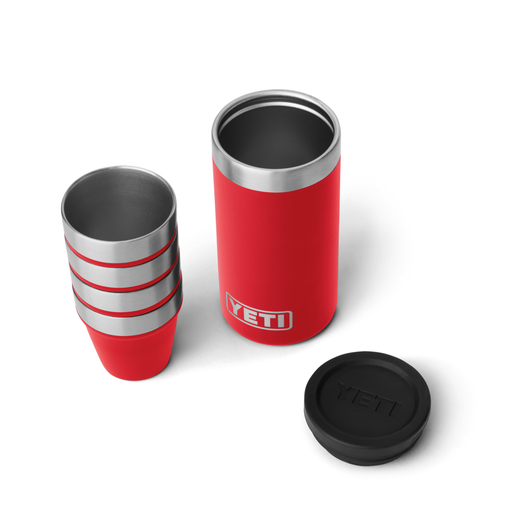 Red insulated durable carrying case with four stacked stainless steel shot glasses for outdoor drinkware use