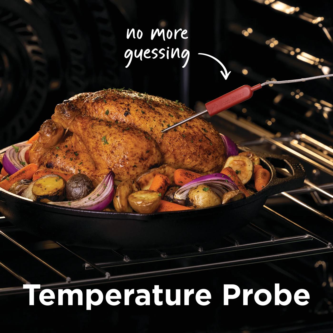 Whole roasted chicken with vegetables cooking in oven using temperature probe for precise cooking in Appliances and Kitchen collections