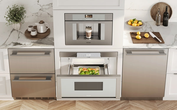 Built-in stainless steel 30-inch MicroDrawer microwave with pull-out drawer in modern kitchen cabinetry setup