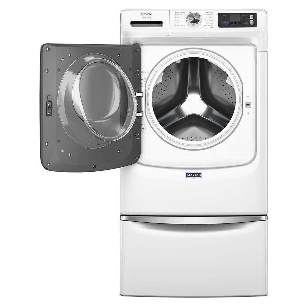 White front load washer with open door and digital controls, part of washers and appliances for home use.