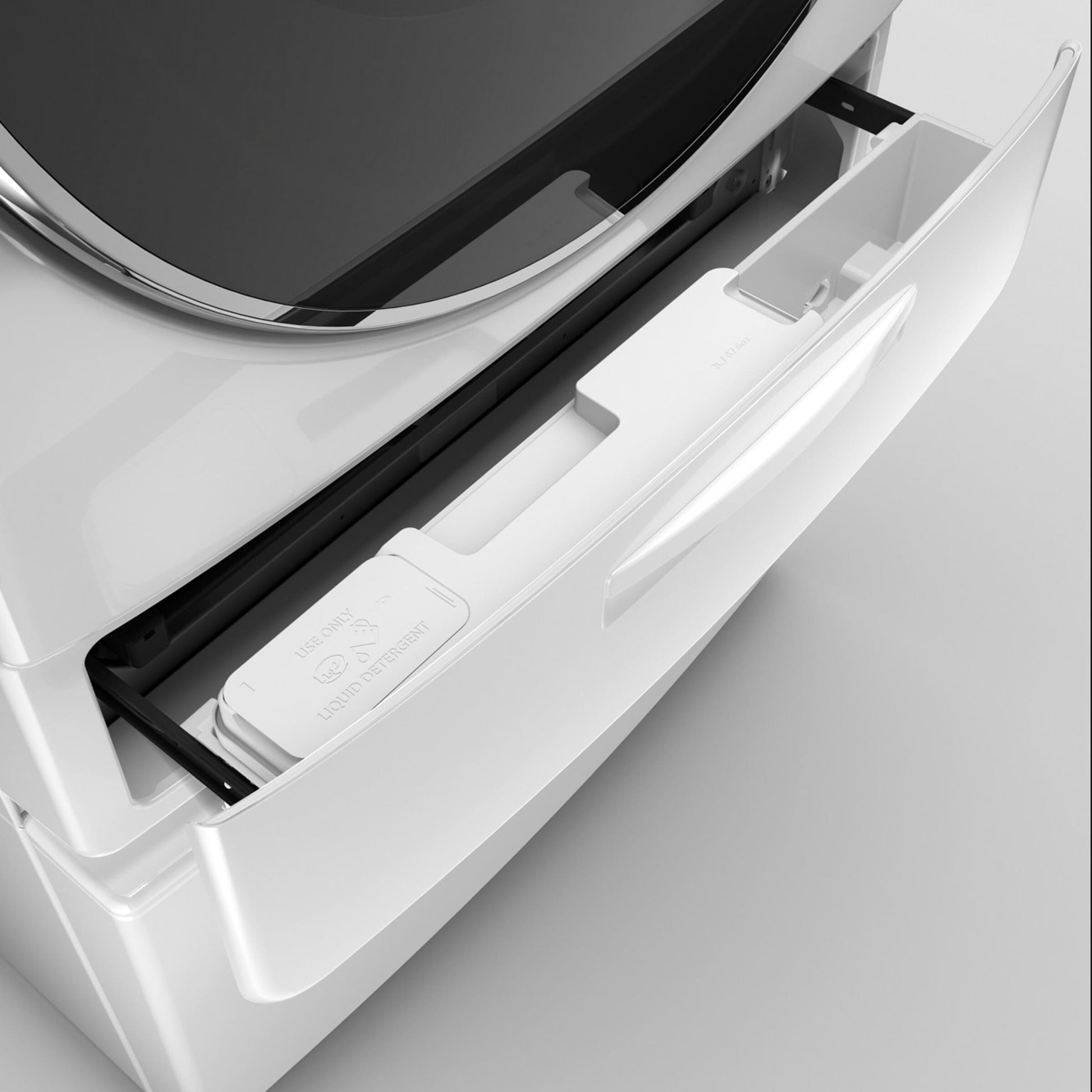 Open detergent compartment drawer on white front load washer in washers and appliances collection