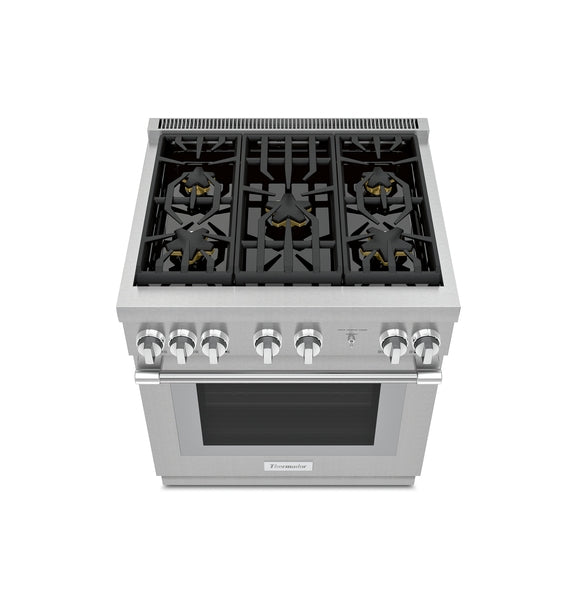 Stainless steel dual fuel range with six knobs and cast iron grates in kitchen appliance collection at Hartville Hardware