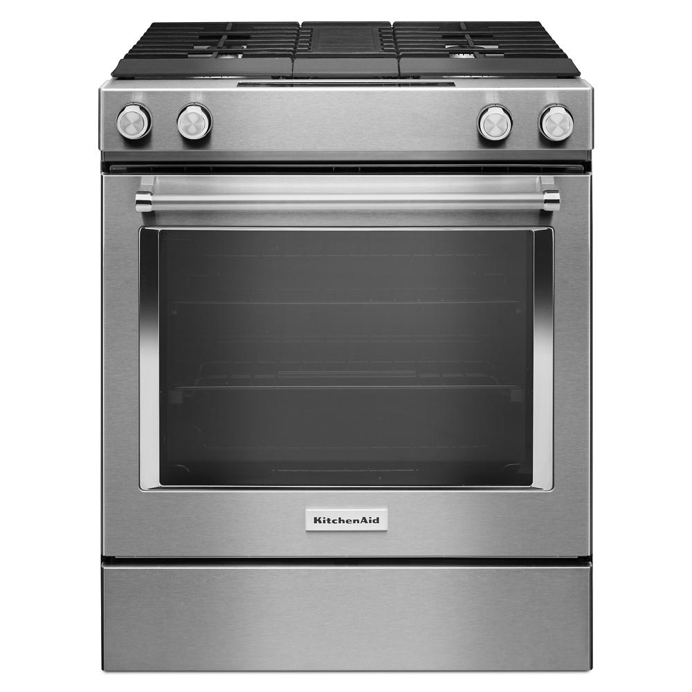 Stainless steel 30-inch dual fuel range with four burners, downdraft vent, and modern KitchenAid design in appliances collection