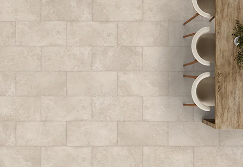 Beige luxury vinyl tile with rigid canvas texture and natural variation for durable home improvement flooring projects