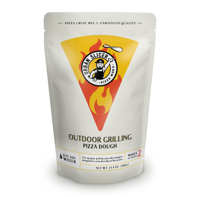 Standing pouch of Urban Slicer brand outdoor grilling pizza dough mix with flame and pizza slice graphic