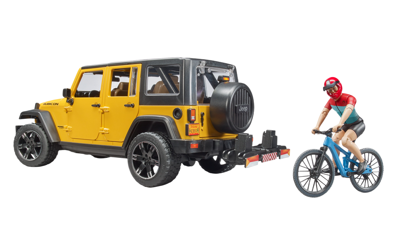 Yellow Bruder Jeep Wrangler Rubicon Unlimited toy with cyclist riding blue bike from Vehicles & Remote Controlled Toys collection