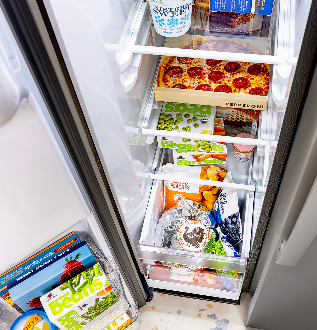 GE® 23.6 Cu. Ft. Counter-Depth Side-By-Side Refrigerator with Extra Tall Dispenser and In-Door Icemaker