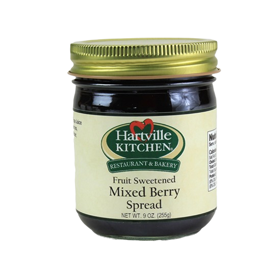 Glass jar of Hartville Kitchen mixed berry fruit spread with gold lid in Jams & Jellies and Food & Beverage collections under $50
