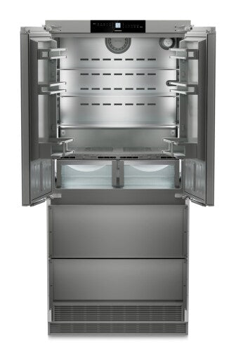 Built-in stainless steel French door refrigerator with open doors, empty shelves, and bottom freezer drawers in appliances collection