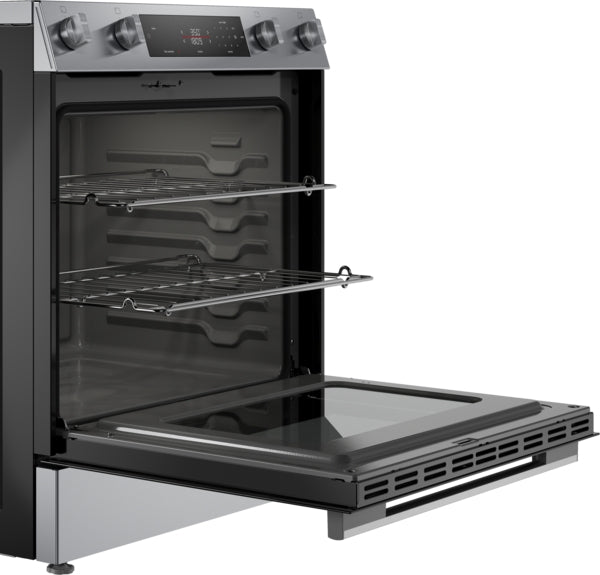 Open stainless steel electric freestanding range with two racks and digital control panel in home kitchen setting