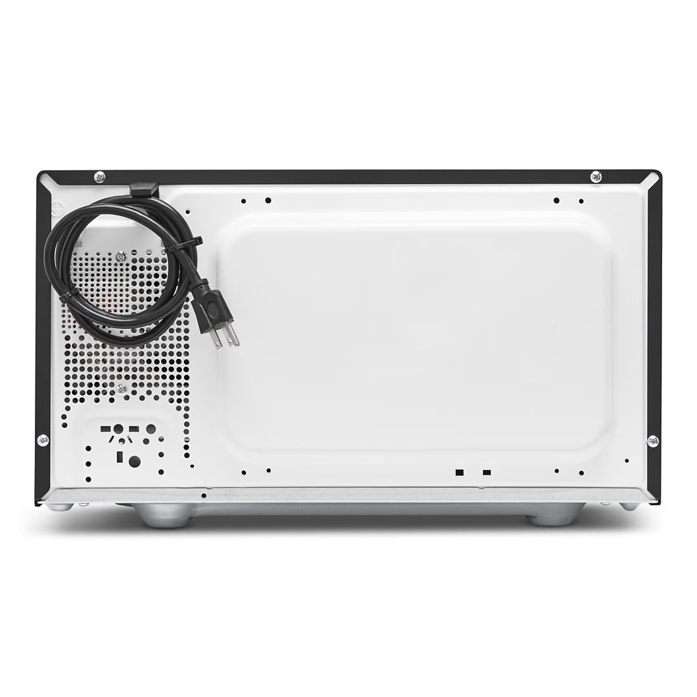 Back view of white countertop microwave with power cord attached from microwaves and kitchen appliances collection