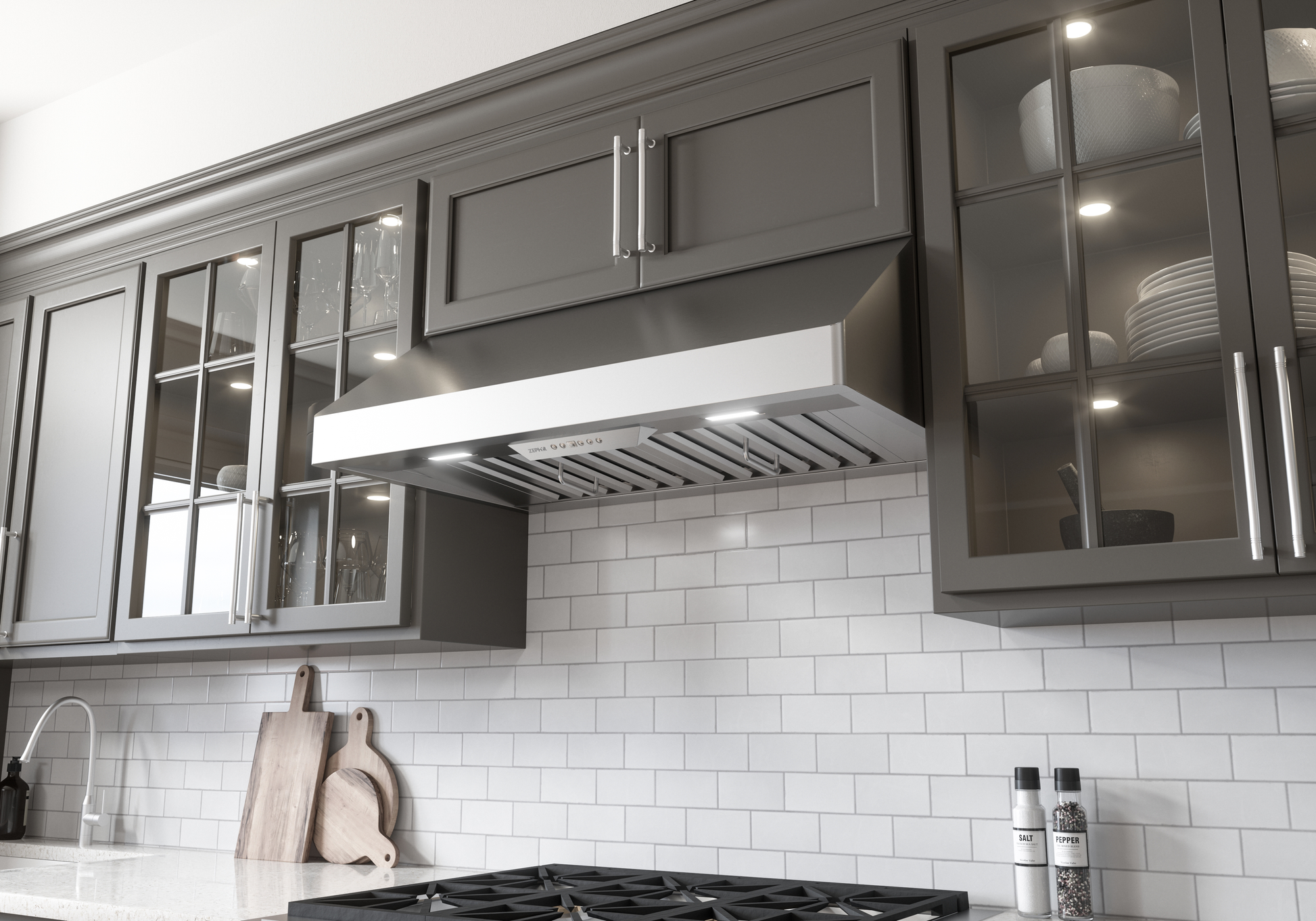 Modern 36-inch under cabinet stainless steel range hood with LED lighting in a kitchen appliances and home improvement setting