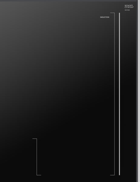 Dark gray smooth glass induction cooktop surface with subtle minimal markings from kitchen appliances collection