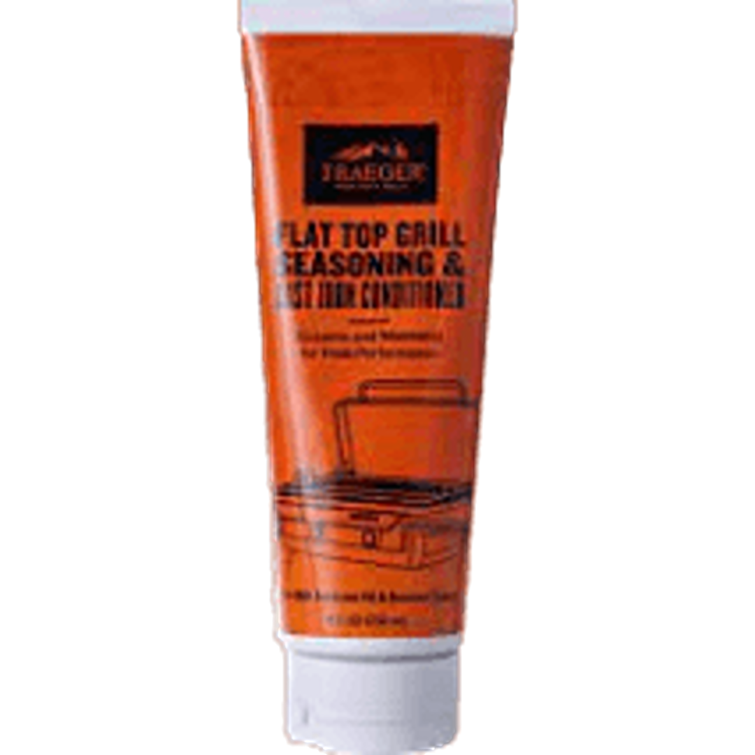 Orange tube of Traeger flat top grill seasoning and cast iron conditioner for grilling tools and outdoor living collections
