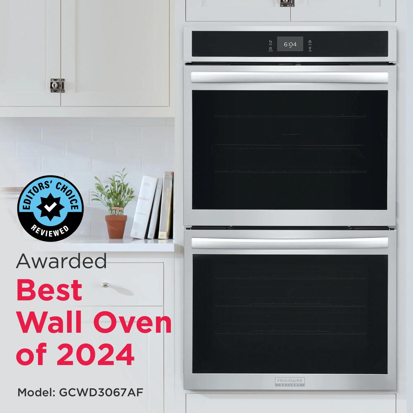 White built-in double electric wall oven with digital control display in modern kitchen setting from Appliances collection