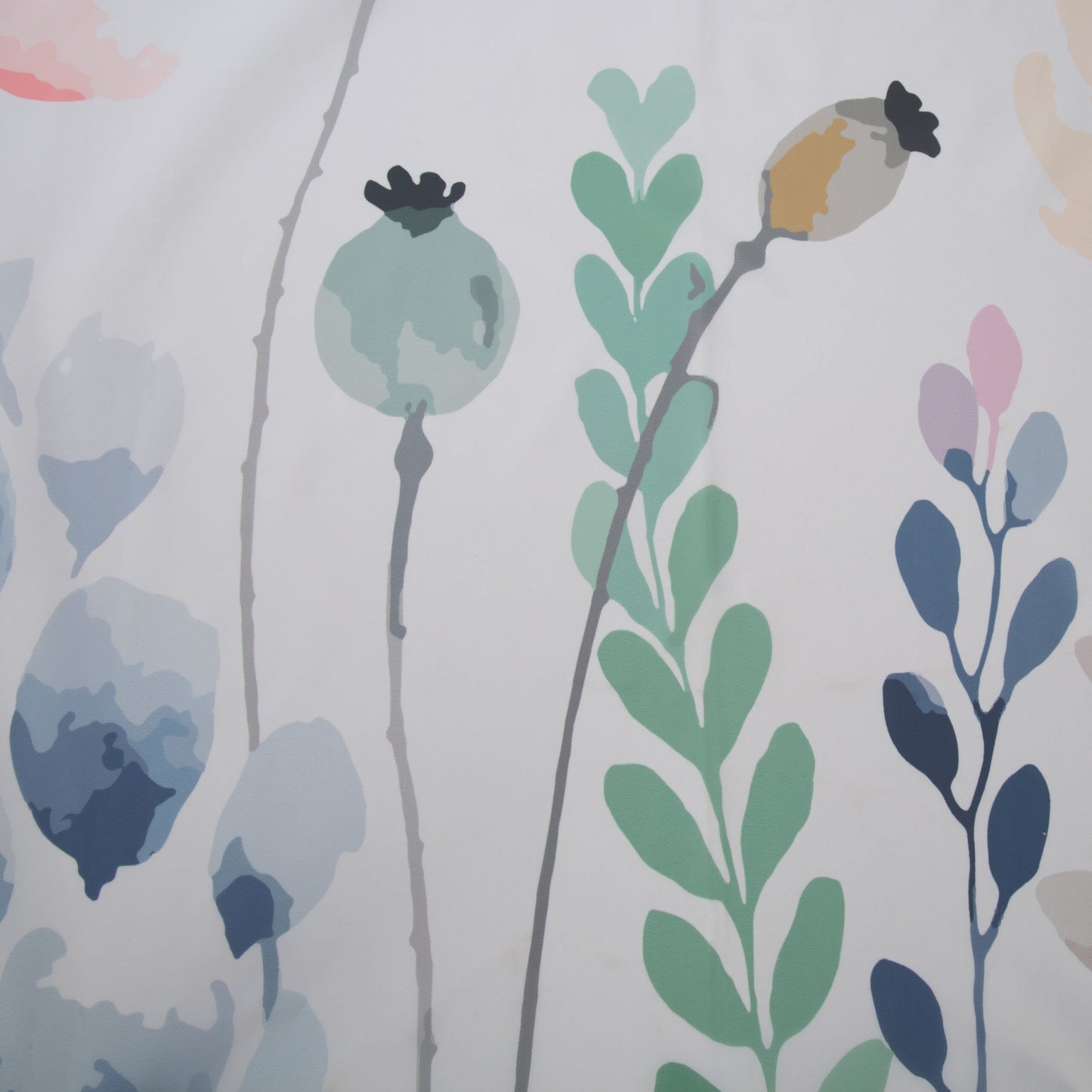 Close-up of soft floral pattern with green leaves and pastel seed pods on fabric shower curtain panel