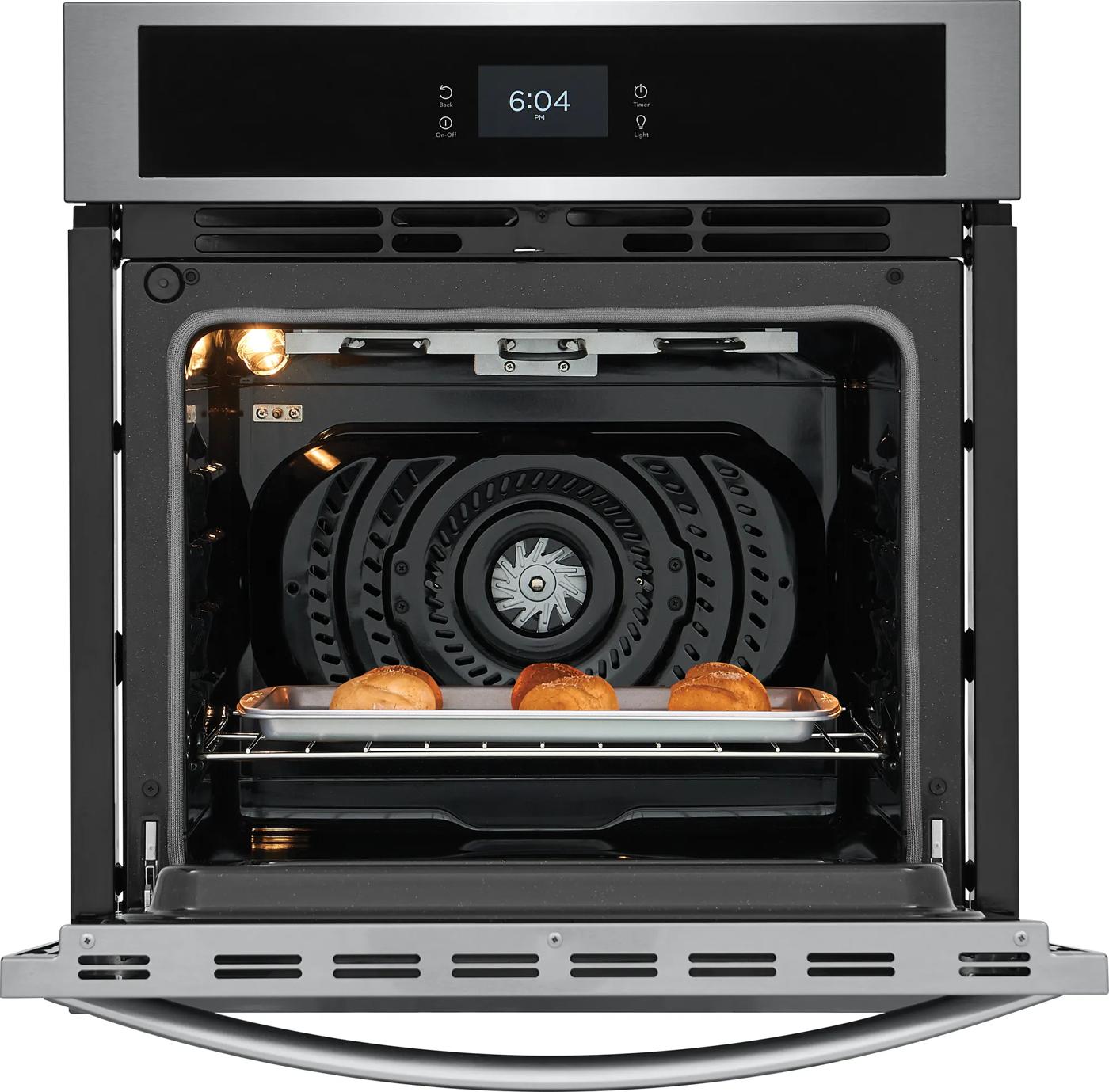 Open stainless steel wall oven with fan convection and digital control panel baking rolls in Kitchen & Kitchenware collection